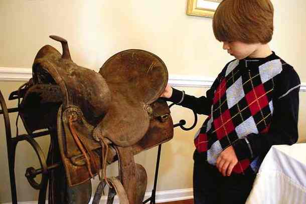 Grannie Annie author with ancestor's saddle